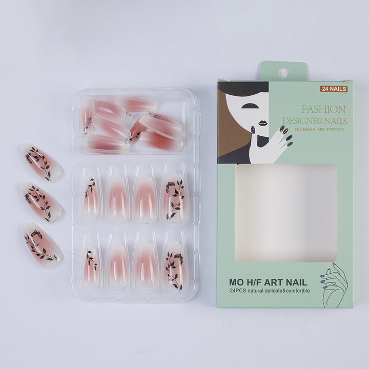 Press-on nails in elegant ombre design with floral accents Kalsten