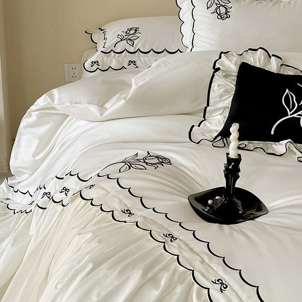 Elegant cotton satin bedding set with contrasting edge embroidery and frill