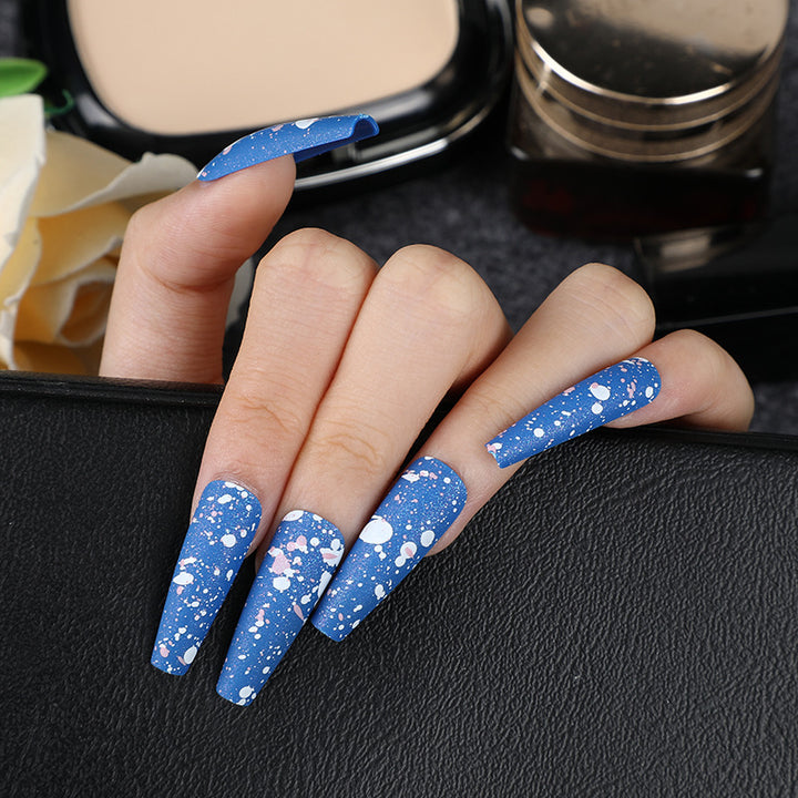 Artistic splatter design artificial nails Kalsten