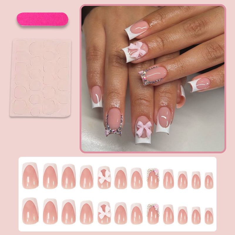 Artificial nail set with elegant bow and glitter designs Kalsten