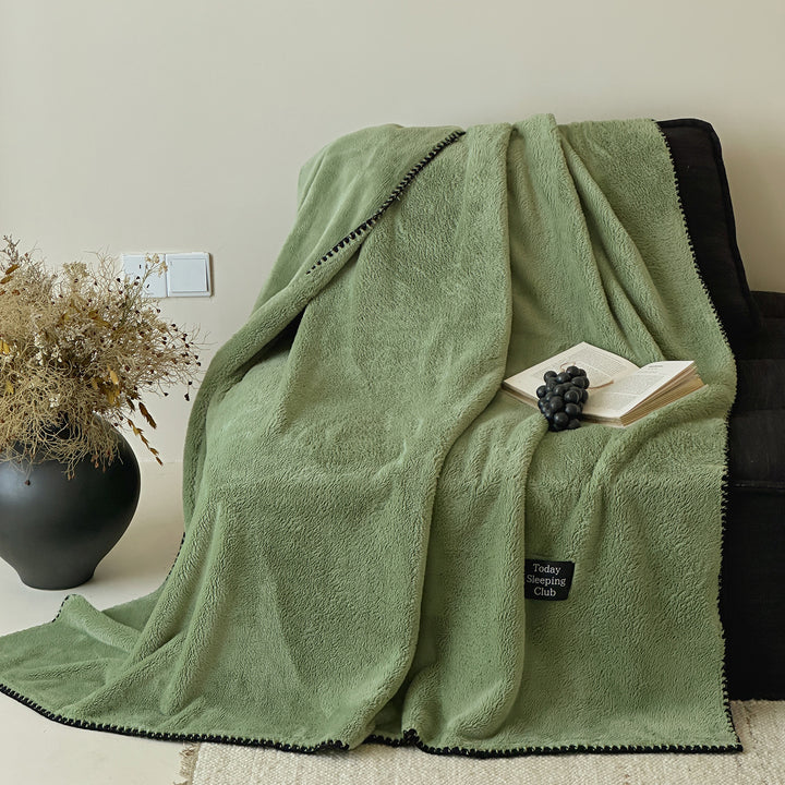 Extra soft microfleece throw blanket with decorative stitching