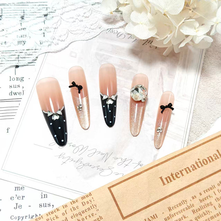 Stylish glitter accent artificial nails with elegant detailing Kalsten