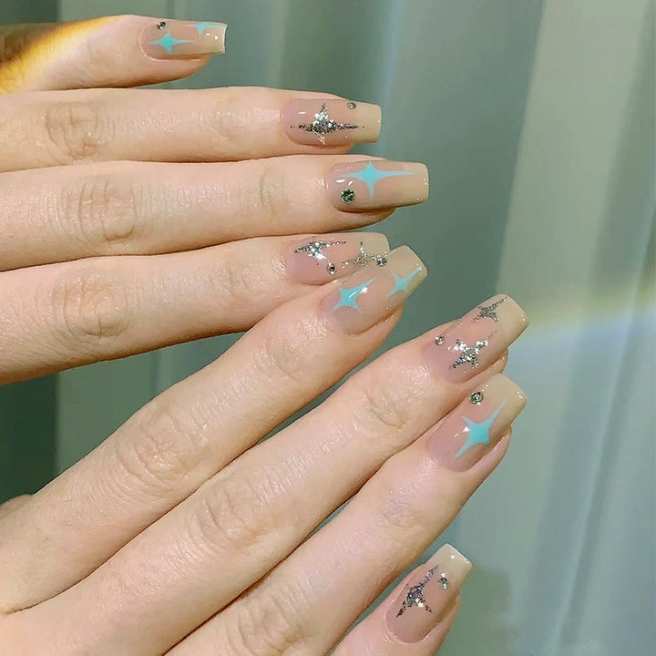 Acrylic nail set with sparkling star and glitter elements Kalsten