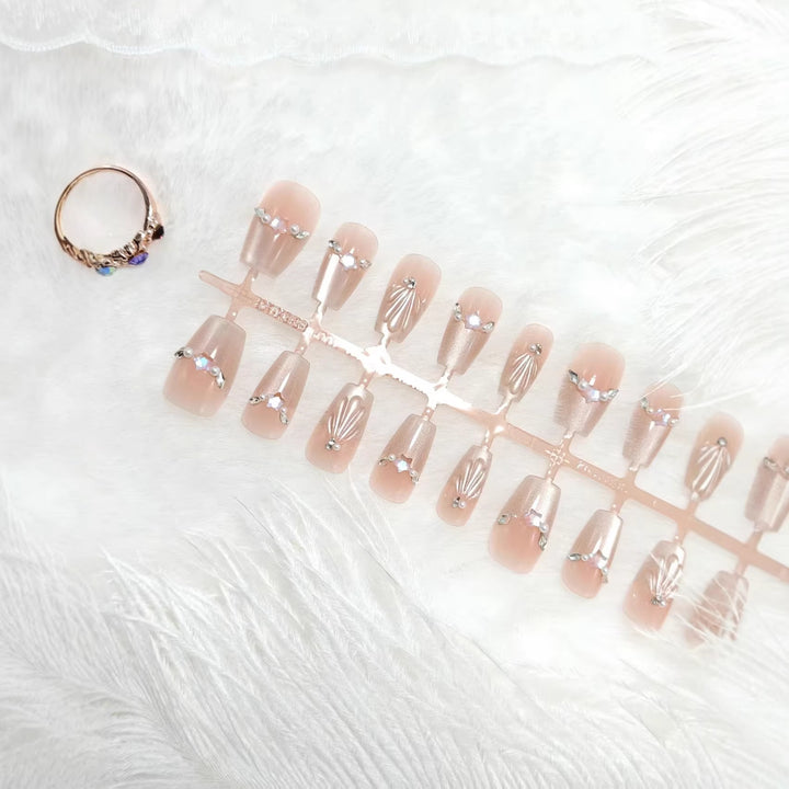 Glamorous artificial nails with filigree 3D decorations Kalsten