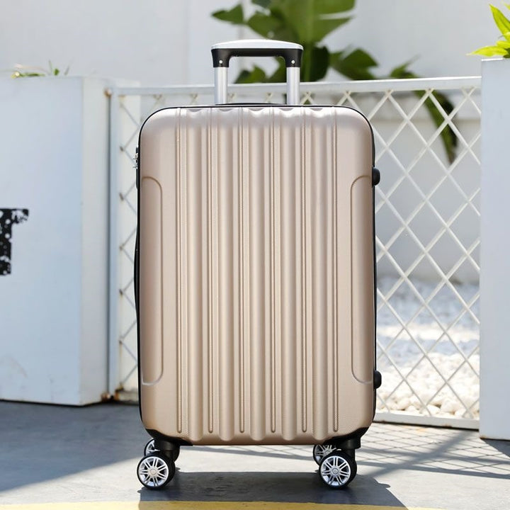 Hard shell suitcase with 360-degree wheel system and integrated safety feature Kalsten
