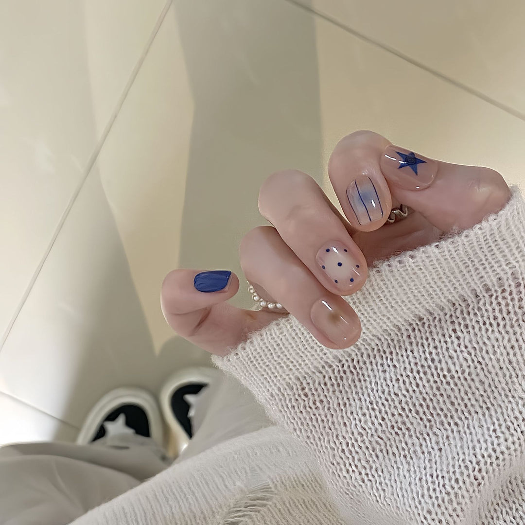 Artificial nails in modern design with geometric and sparkling accents Kalsten