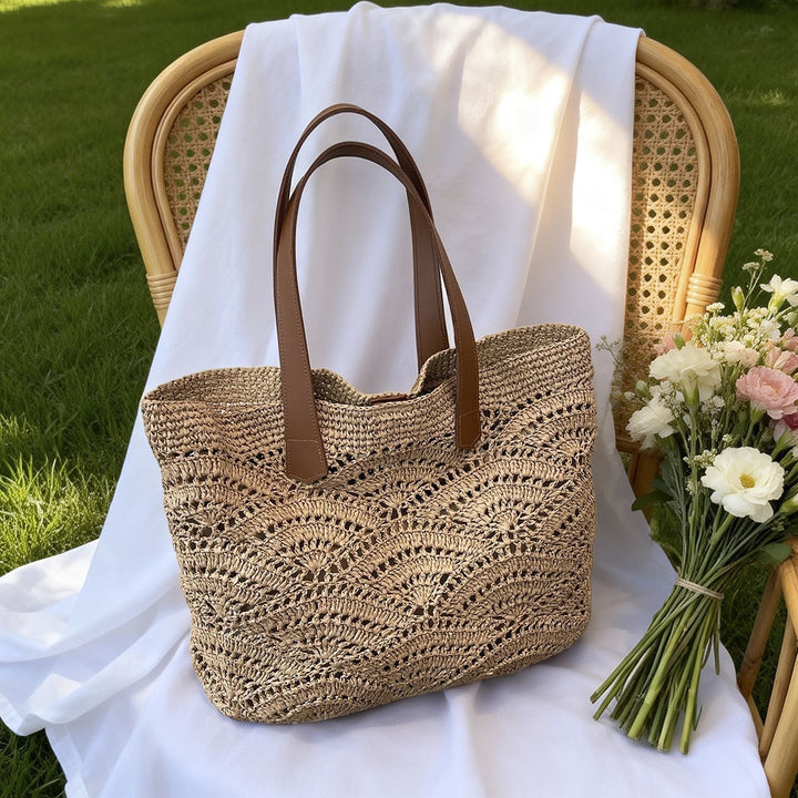 Handbag made of high-quality woven natural material with elegant leather handles Kalsten