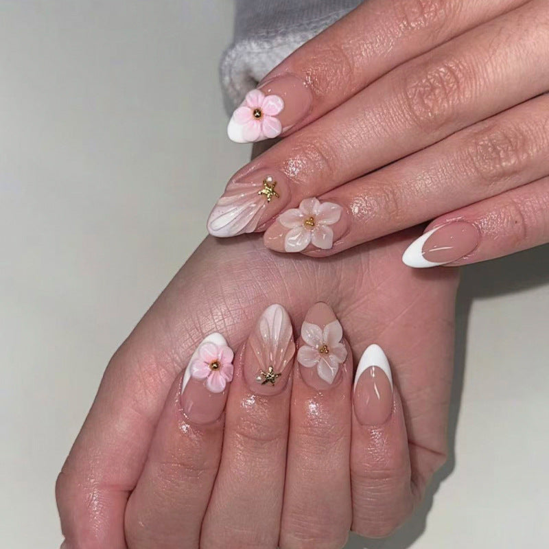 Elegant artificial nails with floral design and glitter accents Kalsten