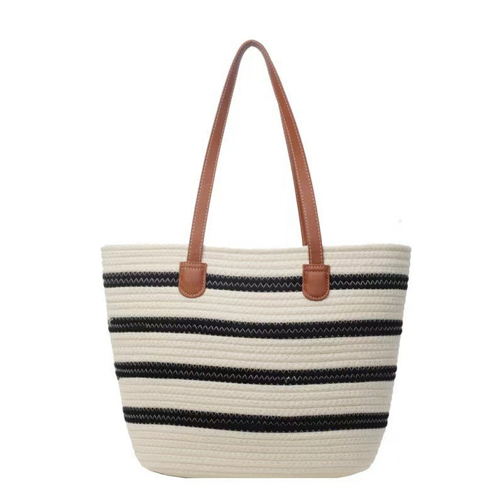 Fashion shopping bag with textured wicker design and leather handles Kalsten