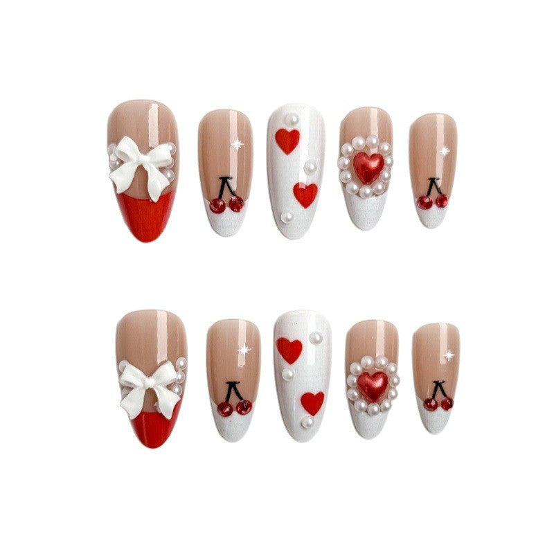 Creative nail art with heart and cherry motifs Kalsten