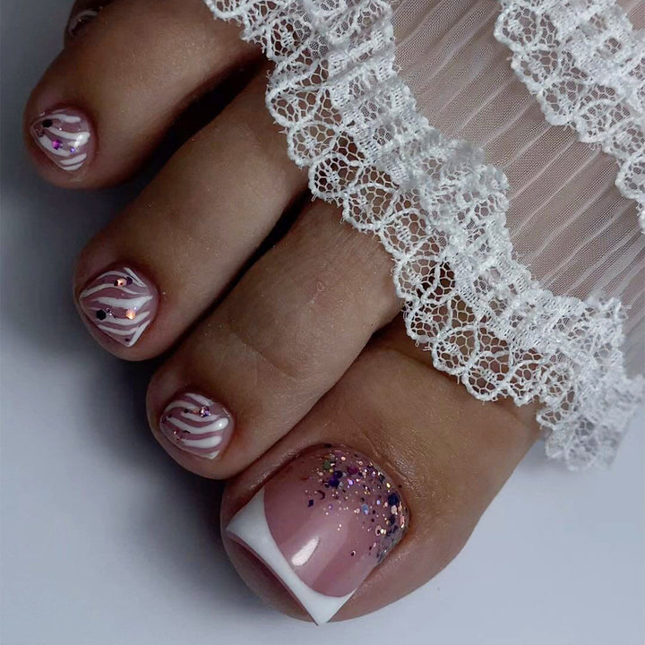 Artful toenail design with glamorous accents Kalsten