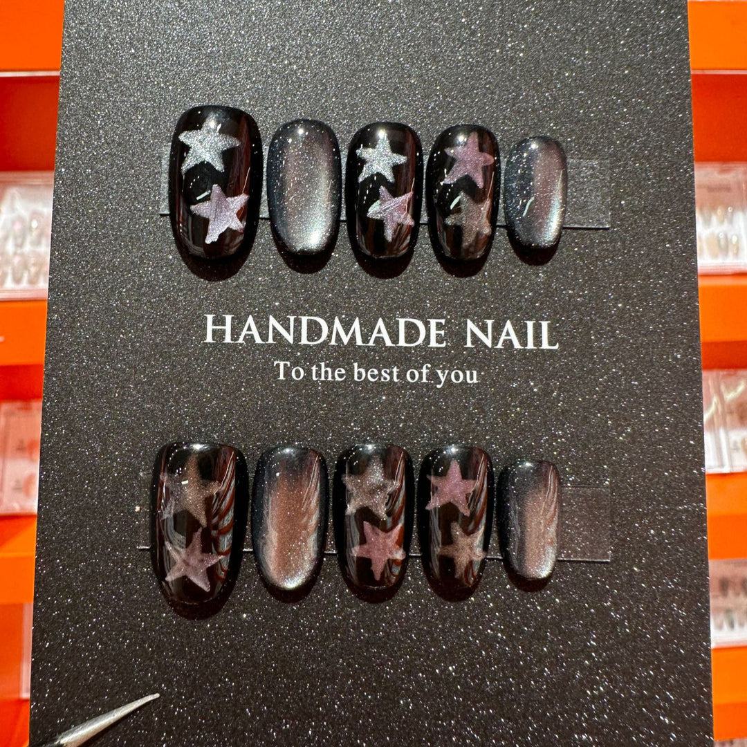 Artistic Press-On Nail Art Set Featuring Handmade Star Designs