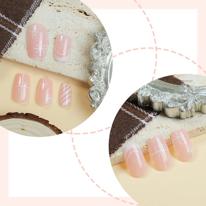 Nail set with elegant floral and striped designs Kalsten