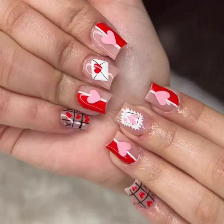 Artificial nail set with romantic heart and envelope motifs Kalsten