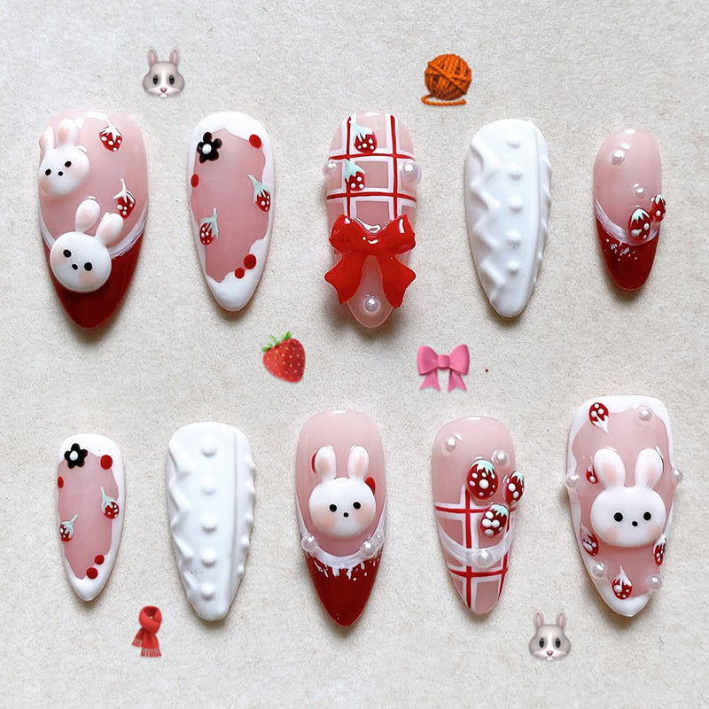 Creative acrylic nail set with playful bunny and gift designs Kalsten