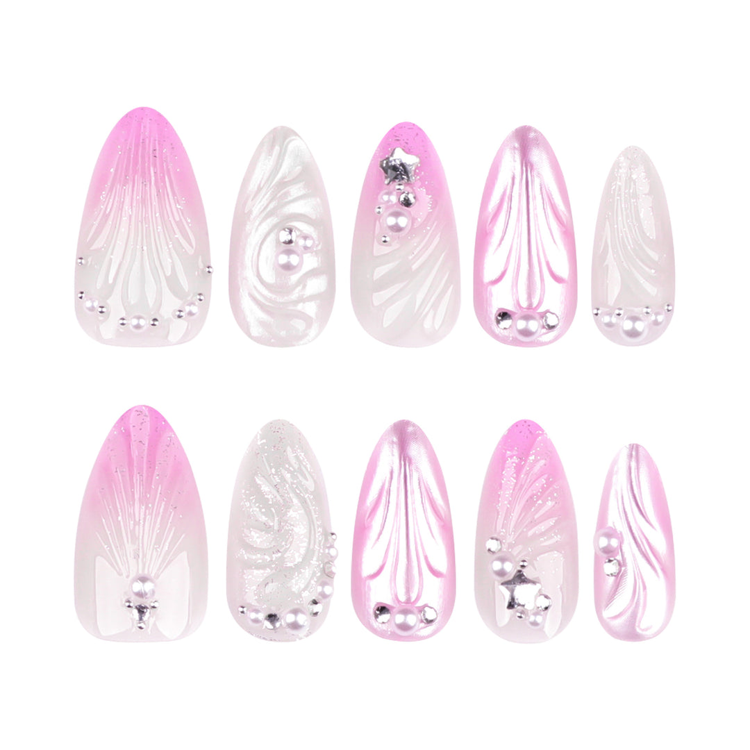 Artificial nail art with elegant swirl design and pearl embellishments Kalsten