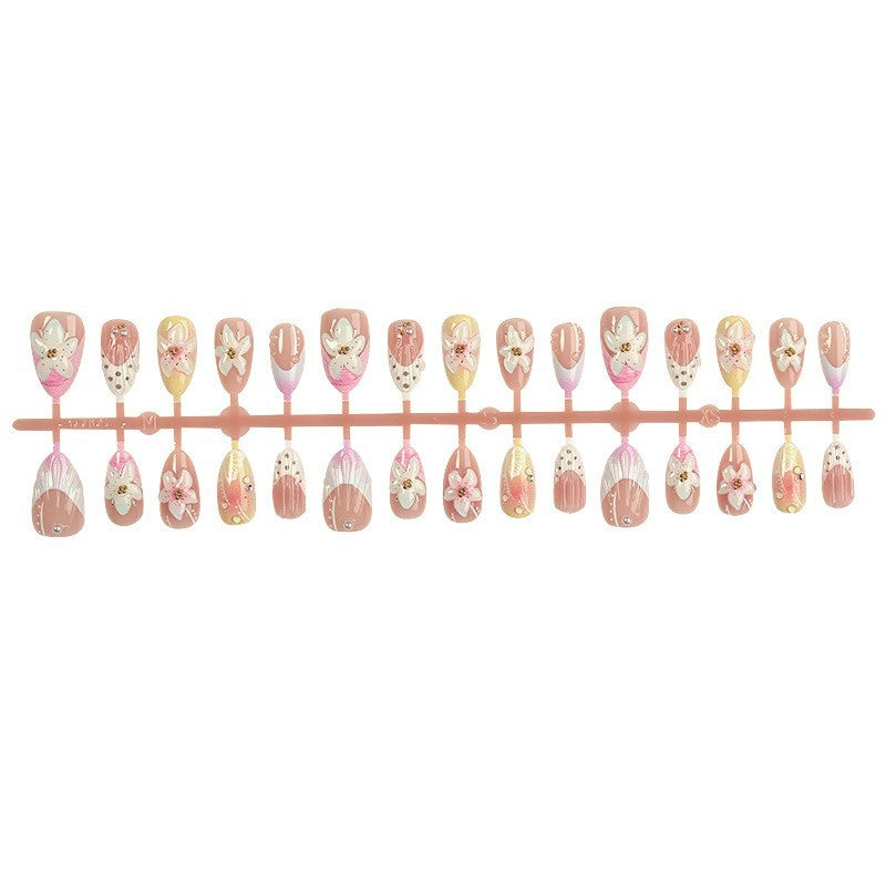 Nail art set with elegant floral design and glitter accents Kalsten