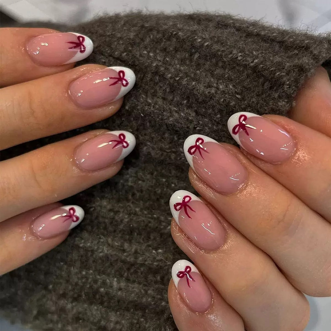 Artificial nail set with elegant bows and French tips Kalsten