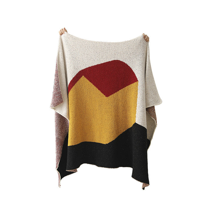 Coarsely woven decorative blanket with geometric jacquard pattern and soft bouclé Kalsten