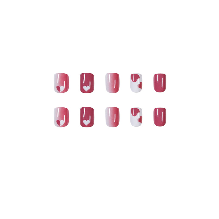 Creative nail art with heart motif and high-gloss finish Kalsten