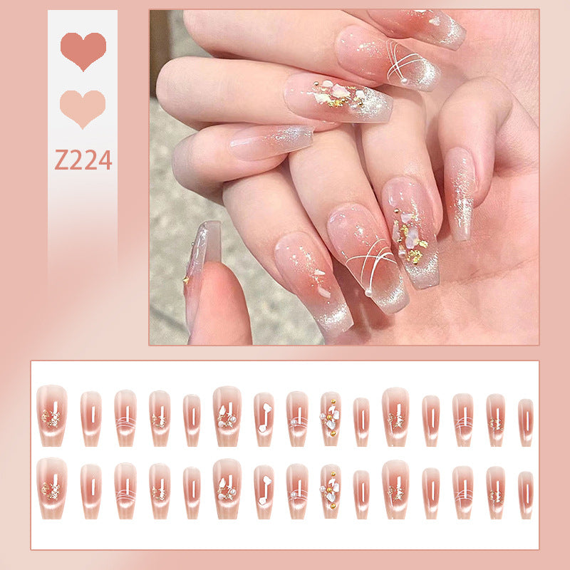 Artificial nail set with elegant glitter and flower decorations Kalsten