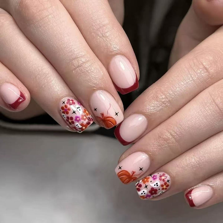 Artificial nail set with cheerful flower designs and elegant French tips Kalsten