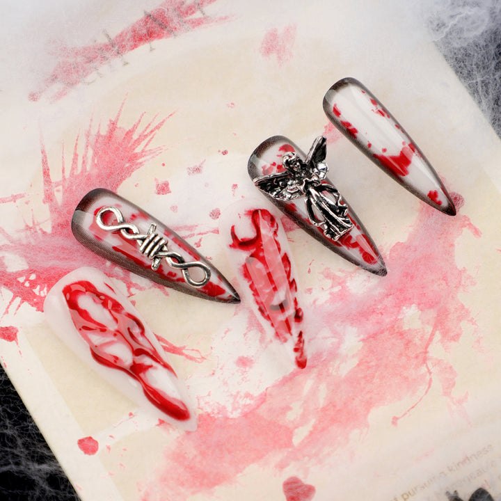 Artistic stiletto nails with blood and 3D design Kalsten