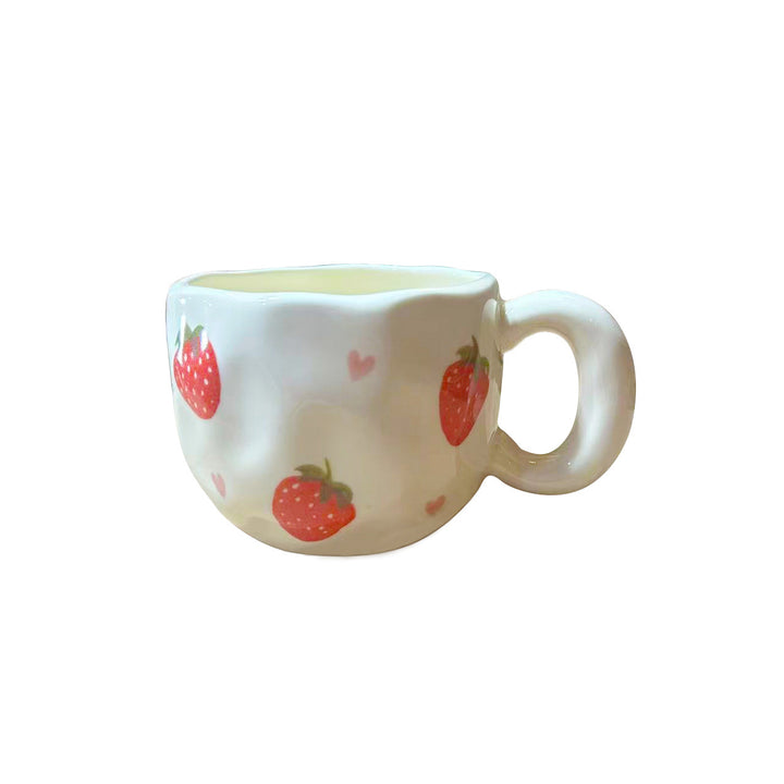 Ceramic mug with hand-painted tulip pattern and organic shape