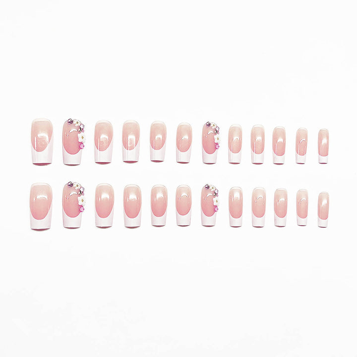 Artificial nail set with elegant floral decorations and transparent finish Kalsten