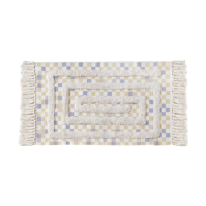 Hand-tufted bathroom mat with fringes, decorative dot-and-dash pattern and non-slip backing Kalsten