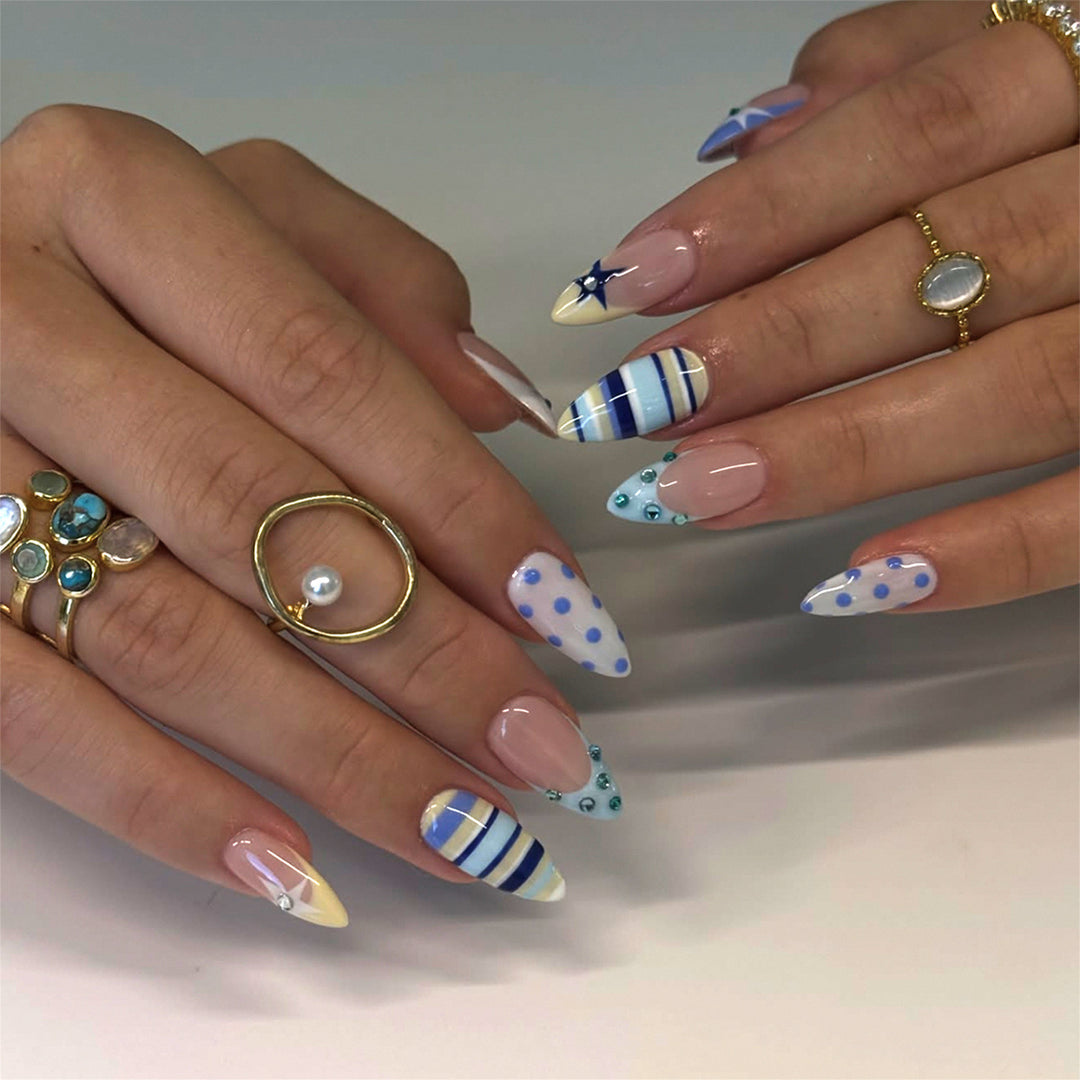 Artful stiletto nails with maritime designs Kalsten