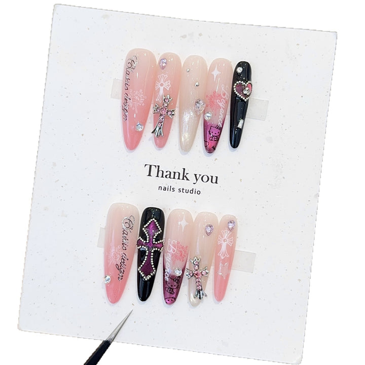 Artificial nails with glamorous accents and sparkling embellishments Kalsten