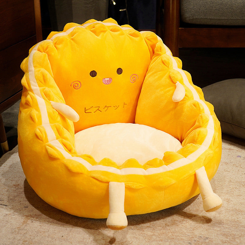 Plush pet bed with raised edge and removable cuddly pillow
