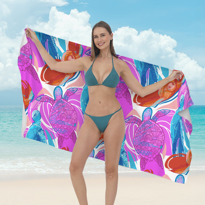 Beach towel with vibrant tropical plant motif Kalsten