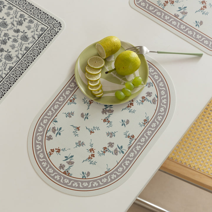 Wipeable table mats made of PU leather with botanical silhouette design Kalsten