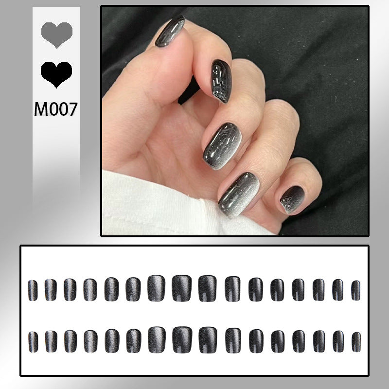Artifical nail set with glamorous ombre effect and glitter embellishments Kalsten