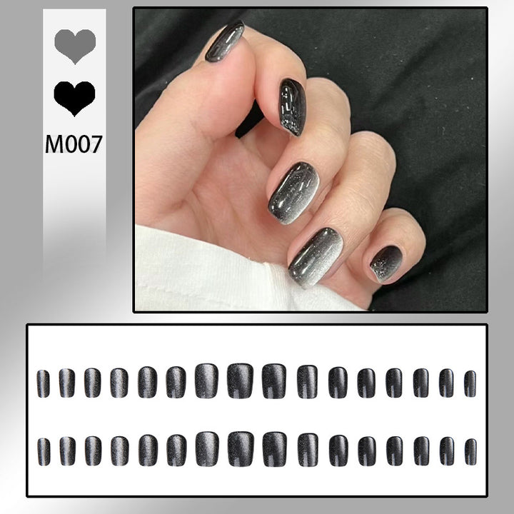 Artifical nail set with glamorous ombre effect and glitter embellishments Kalsten