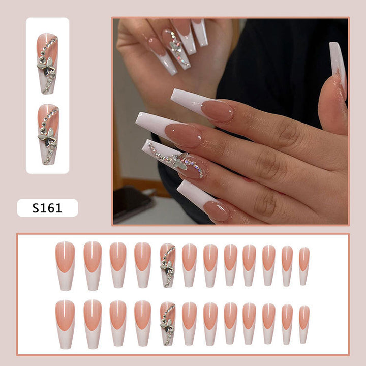 Acrylic nail set with glamorous tips embellishments and elegant accents Kalsten