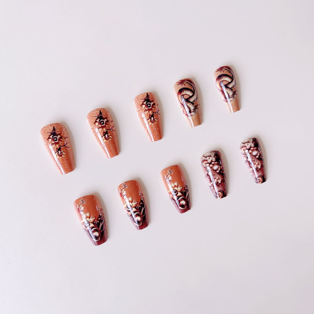 Elegant artificial nail set with 3D dragon designs and gold accents Kalsten