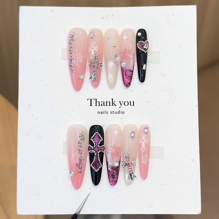 Artificial nails with glamorous accents and sparkling embellishments Kalsten