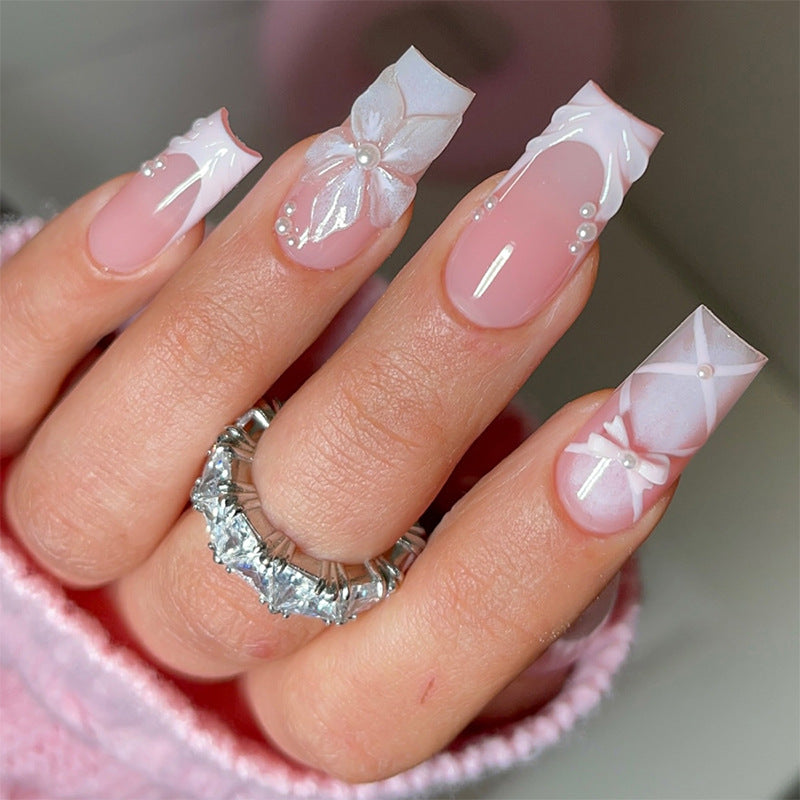 Artificial nail sets with elegant floral accents Kalsten