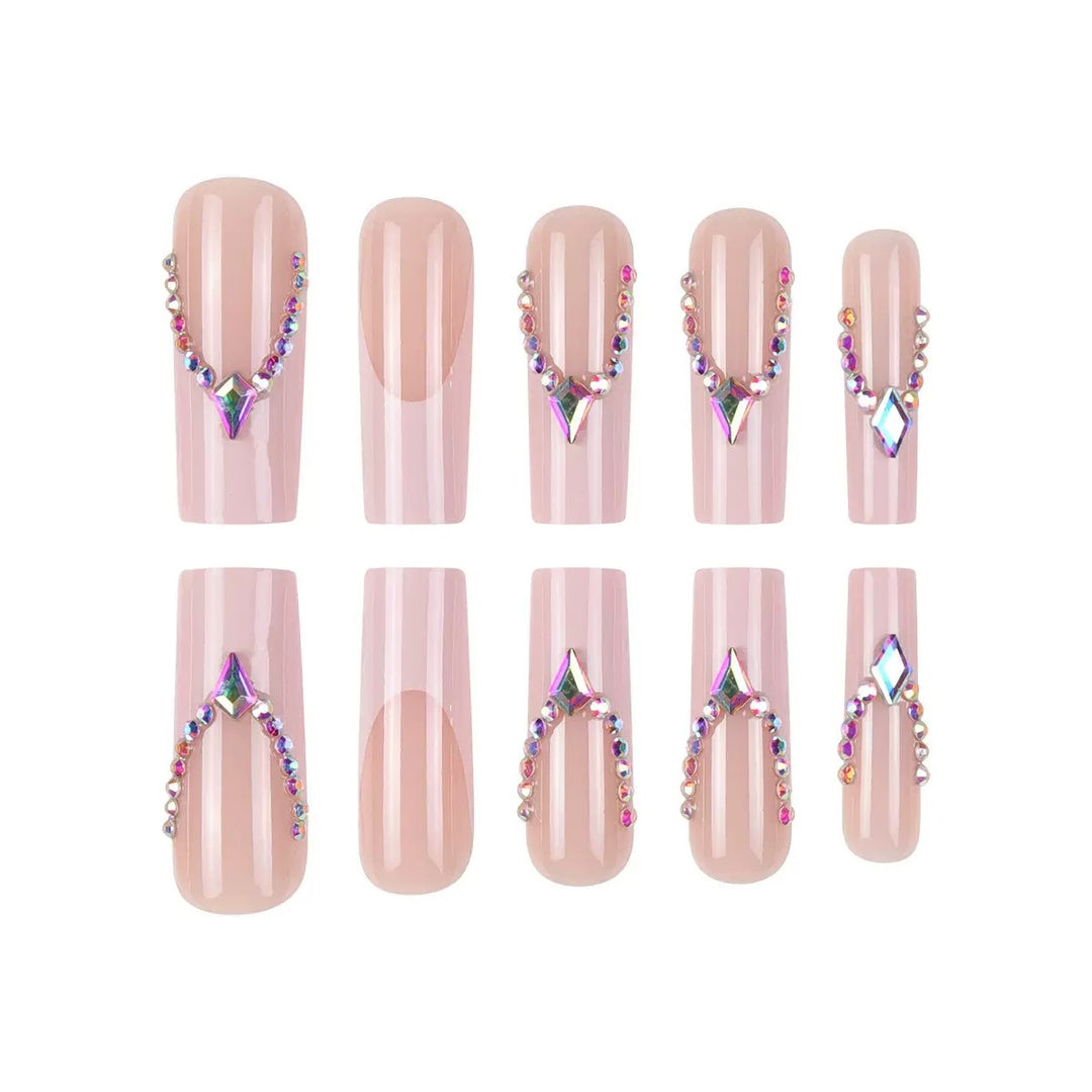 Glamorous artificial nails with sparkling rhinestone embellishments Kalsten