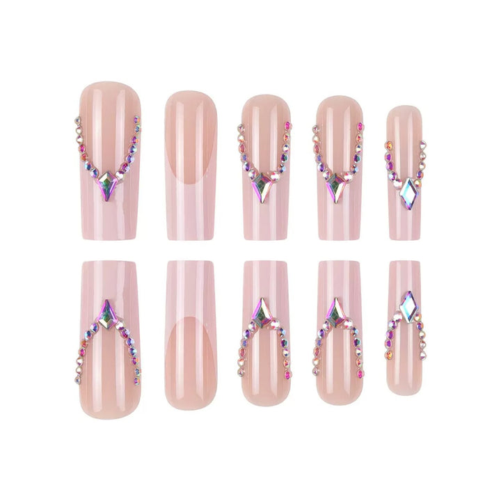 Glamorous artificial nails with sparkling rhinestone embellishments Kalsten