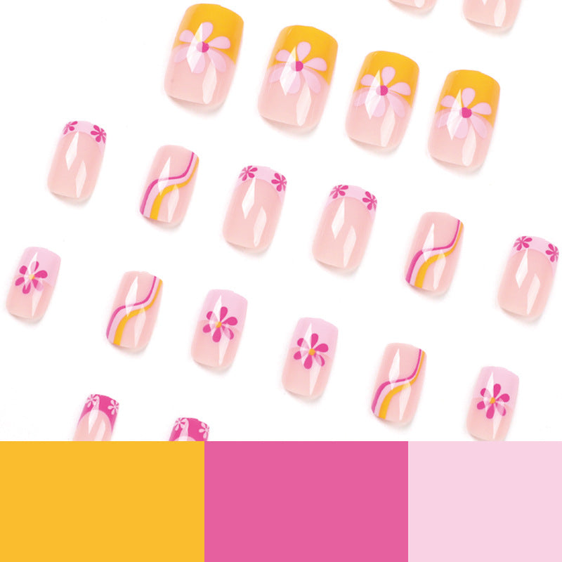 Creative Nail Art with Floral Design and Colorful Accents Kalsten