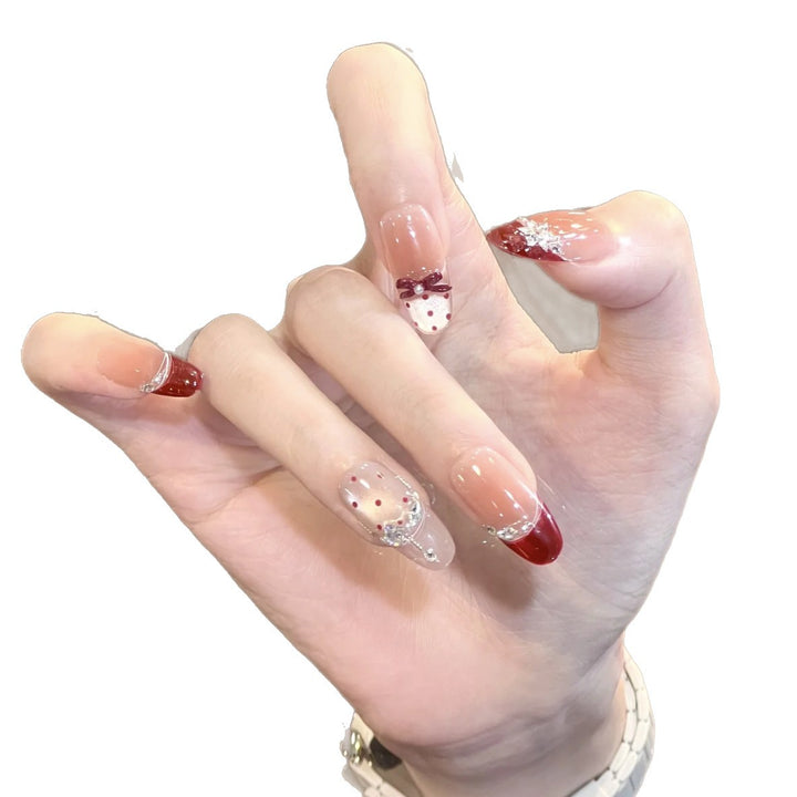 Artificial nails with glitter and tip accents Kalsten