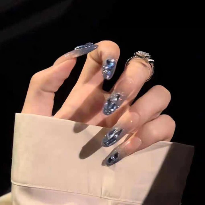 Artificial nails in creative moon and star design Kalsten