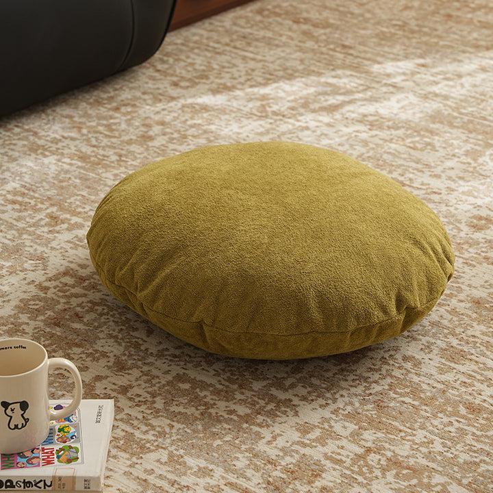 Round floor seat pouf made of teddy plush with a shape-retaining padded core Kalsten