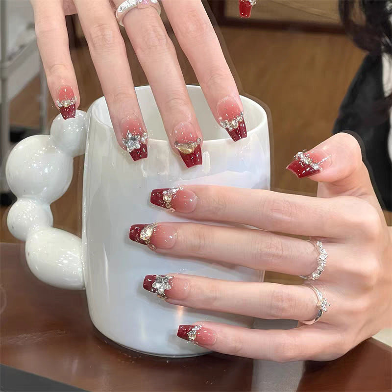 Decorative Rhinestone-Embellished Nail Art Kalsten