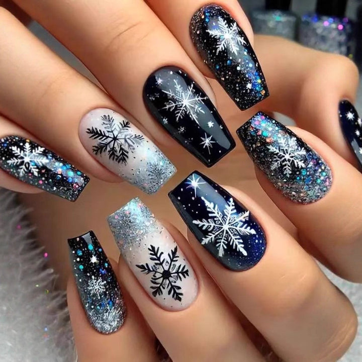 Nail art set with sparkling snowflakes and glitter accents Kalsten