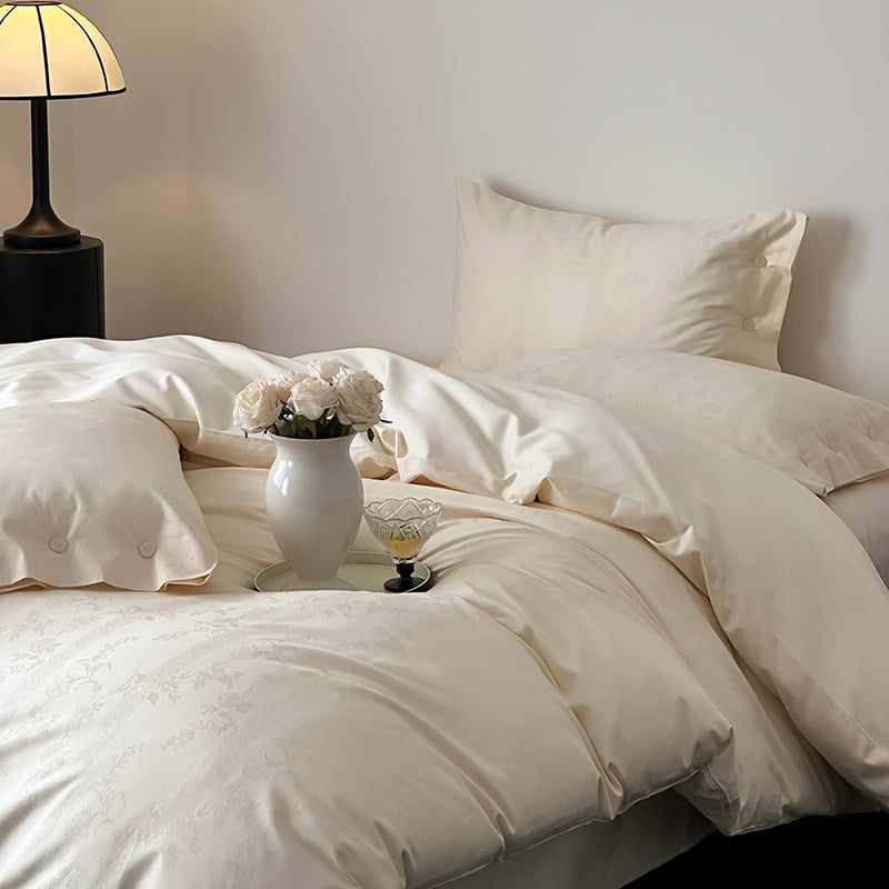 Premium duvet cover set made of cotton satin with tonal floral jacquard and button closure